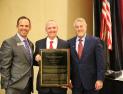 Dr. Thacker receiving his award from IAPSS