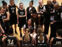 Penn Coach Kristi Ulrich with the Penn Girls Basketball team
