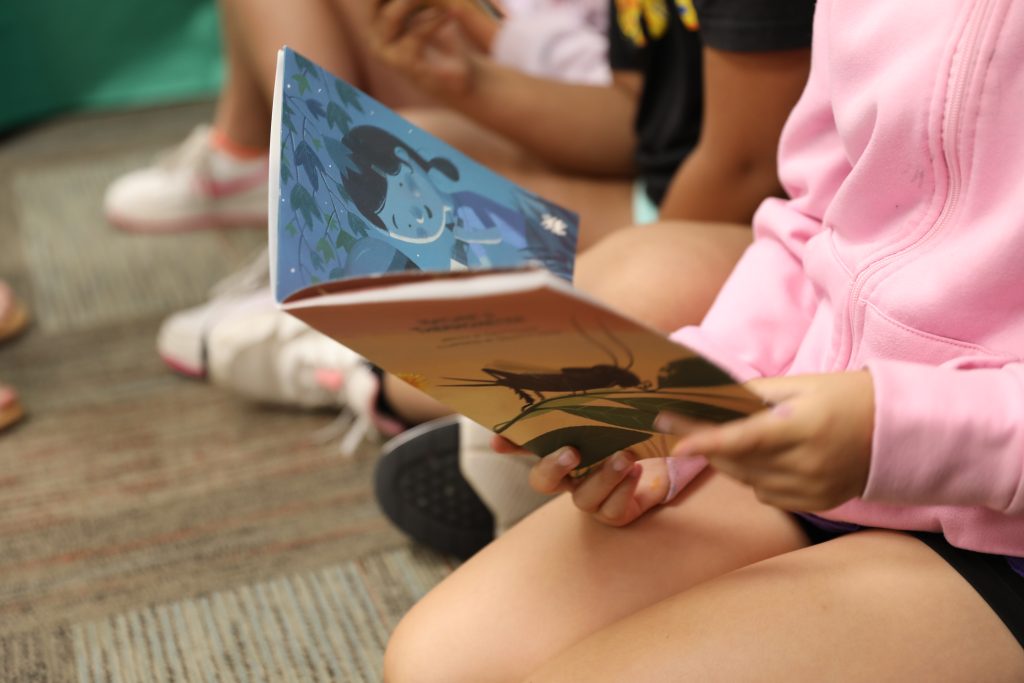 students reading book