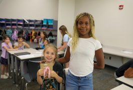 Students pose together.