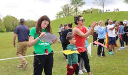 Running is Elementary: PHM staff volunteers & parents cheering